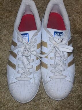 adidas White Sneakers with Gold Stripes and Red Insoles